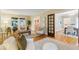 Spacious living room with hardwood floors connecting to dining room, filled with natural light at 140 E 44Th St, Indianapolis, IN 46205