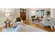 Living room featuring hardwood floors and neutral color palette at 140 E 44Th St, Indianapolis, IN 46205