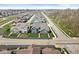 Aerial view of neighborhood featuring rooflines, tree lined streets, and sidewalks at 14234 Community Dr, Carmel, IN 46033