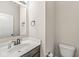 Cozy bathroom with a modern vanity and toilet at 14234 Community Dr, Carmel, IN 46033