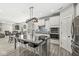 Modern kitchen featuring a large island, stainless steel appliances, and sleek finishes at 14234 Community Dr, Carmel, IN 46033