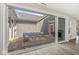 Charming outdoor patio with stone pavers, comfortable seating, and a grill at 14234 Community Dr, Carmel, IN 46033