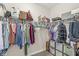 Functional walk-in closet with organized shelving, hanging rods, and storage cubes at 14234 Community Dr, Carmel, IN 46033