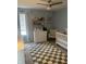Cozy bedroom with a crib, accent chair, neutral decor, and ample natural light at , Greenwood, IN 46143