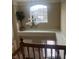 Bright foyer featuring a decorative chandelier, shelf, and large window overlooking the street at , Greenwood, IN 46143