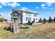 Backyard with a play set, green space, and a patio for outdoor enjoyment at 14347 Camelot House Way, Fishers, IN 46037