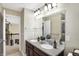 Bathroom featuring double sinks, granite counters, modern faucets and great lighting at 14347 Camelot House Way, Fishers, IN 46037