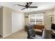 Bedroom featuring a ceiling fan, accent lighting and a window overlooking the lake at 14347 Camelot House Way, Fishers, IN 46037