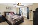 Bedroom featuring a bed, ceiling fan, window with blinds and neutral paint at 14347 Camelot House Way, Fishers, IN 46037
