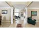 Spacious foyer with tile flooring, decorative columns, and open view to other rooms at 14347 Camelot House Way, Fishers, IN 46037