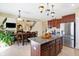 Bright kitchen with stainless steel appliances, ample cabinetry, and an open layout to living areas at 14347 Camelot House Way, Fishers, IN 46037