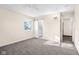 Spacious bedroom with neutral walls and an en suite bathroom at 15620 E State Road 46, Columbus, IN 47203