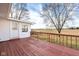 Spacious wooden deck offers an inviting outdoor space perfect for relaxation and entertainment at 15620 E State Road 46, Columbus, IN 47203