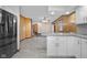 Open concept kitchen featuring granite countertops and an island at 15620 E State Road 46, Columbus, IN 47203