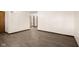 View of the room featuring wood-look flooring, with open access to other rooms at 15620 E State Road 46, Columbus, IN 47203