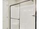 White shower with sliding glass door and chrome trim at 1603 Clover Crossing Dr # 1A, Greenfield, IN 46140