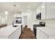 Modern kitchen with island, stainless appliances, and abundant cabinet space for functionality and style at 1609 Clover Crossing Dr, Greenfield, IN 46140