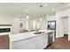 Beautiful kitchen with a large island, stainless steel appliances, and easy access to the dining area and living spaces at 1609 Clover Crossing Dr, Greenfield, IN 46140