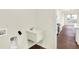 Convenient laundry room featuring a utility sink, and hookups at 1609 Clover Crossing Dr, Greenfield, IN 46140