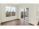 Bright sunroom with large windows and a sliding glass door, offering great natural light and an outdoor view at 1609 Clover Crossing Dr, Greenfield, IN 46140