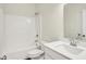 Bathroom features a bathtub, toilet, and single vanity with a bright white color palette at 1615 Clover Crossing Dr # 2A, Greenfield, IN 46140