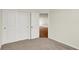 Bedroom with large closet that leads to an open kitchen at 1615 Clover Crossing Dr # 2A, Greenfield, IN 46140