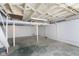 Unfinished basement, showcasing exposed ceiling beams and concrete flooring at 1817 Medford Ave, Indianapolis, IN 46222