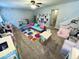 Bright playroom features colorful accents, toy storage, and a cozy seating area for children at 1934 St James Pl, Columbus, IN 47201