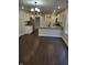 Open-concept kitchen featuring stainless steel appliances, granite countertops and modern lighting at 1974 Ralston Ave, Indianapolis, IN 46218