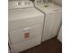 Modern laundry room with white washer and dryer units at 1974 Ralston Ave, Indianapolis, IN 46218