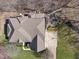 Overhead aerial view of the home showcasing the roof, deck, firepit and landscaping at 2163 Laurel Leaf Ln, Avon, IN 46123
