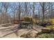 Enjoy outdoor living with a hot tub and patio set in a lush backyard setting at 2163 Laurel Leaf Ln, Avon, IN 46123