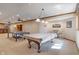 Spacious finished basement featuring a pool table and ping pong table for recreation and Gathering fun at 2163 Laurel Leaf Ln, Avon, IN 46123