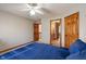 Spacious bedroom with an open entrance to the bathroom featuring double vanity sinks at 2163 Laurel Leaf Ln, Avon, IN 46123