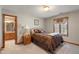 Bedroom with a queen bed and an en-suite bathroom at 2163 Laurel Leaf Ln, Avon, IN 46123