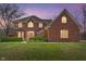Beautiful two-story brick home with manicured landscaping, showcasing a welcoming facade at 2163 Laurel Leaf Ln, Avon, IN 46123