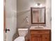 Charming half bathroom with stylish vanity, decorative mirror, and elegant fixtures creating a welcoming space at 2163 Laurel Leaf Ln, Avon, IN 46123