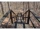Wooden stairs lead down to the secluded backyard at 2163 Laurel Leaf Ln, Avon, IN 46123