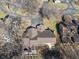 Overhead view of the home highlighting the deck, driveway, surrounding trees, and community layout at 2215 Van Ness Pl, Indianapolis, IN 46240