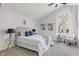 Bright bedroom with vaulted ceilings, large arched windows, and stylish decor at 2215 Van Ness Pl, Indianapolis, IN 46240