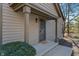 Inviting front porch with neutral siding and a stylish entry door at 2215 Van Ness Pl, Indianapolis, IN 46240