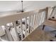 Open view of the living room from the upstairs landing, highlighting the open floor plan at 2215 Van Ness Pl, Indianapolis, IN 46240