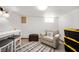 Finished basement rec room with seating area, perfect for relaxation and entertainment at 229 W Taylor St, Pendleton, IN 46064