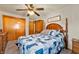 Comfortable bedroom with hardwood furniture, closet, and cozy bedding for a relaxing retreat at 229 W Taylor St, Pendleton, IN 46064