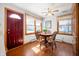 Charming dining area with natural light and a wooden table with chairs, ideal for cozy meals at 229 W Taylor St, Pendleton, IN 46064