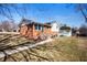 Charming brick and siding home with a well-kept front lawn on a sunny day at 229 W Taylor St, Pendleton, IN 46064