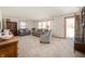 Spacious living room with neutral carpet, comfortable sofas, natural light, and a welcoming atmosphere at 229 W Taylor St, Pendleton, IN 46064