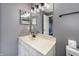 Stylish bathroom featuring vanity with ample lighting, and modern fixtures, offering a clean and contemporary feel at 240 Legends Creek # 206, Indianapolis, IN 46229
