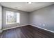 Bedroom with wood floor and natural light from the window at 240 Legends Creek # 206, Indianapolis, IN 46229