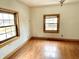 Bedroom with hardwood floors and two windows at 2839 E 19Th St, Indianapolis, IN 46218